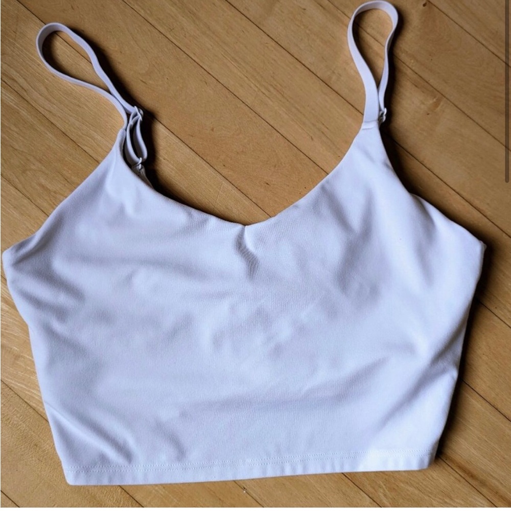 V neck cropped top with built in shelf bra. EUC. Adjustable straps.